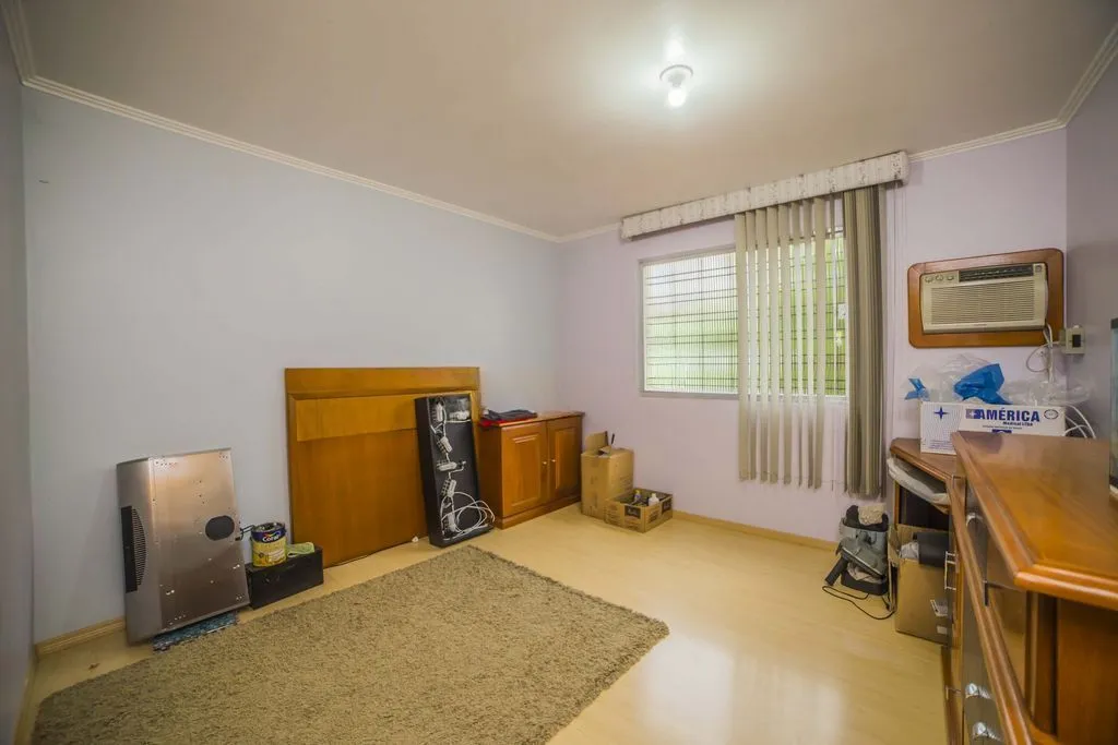 Imagem Casa de 4 dormitórios à venda no Bairro Santa Tereza - Porto Alegre
