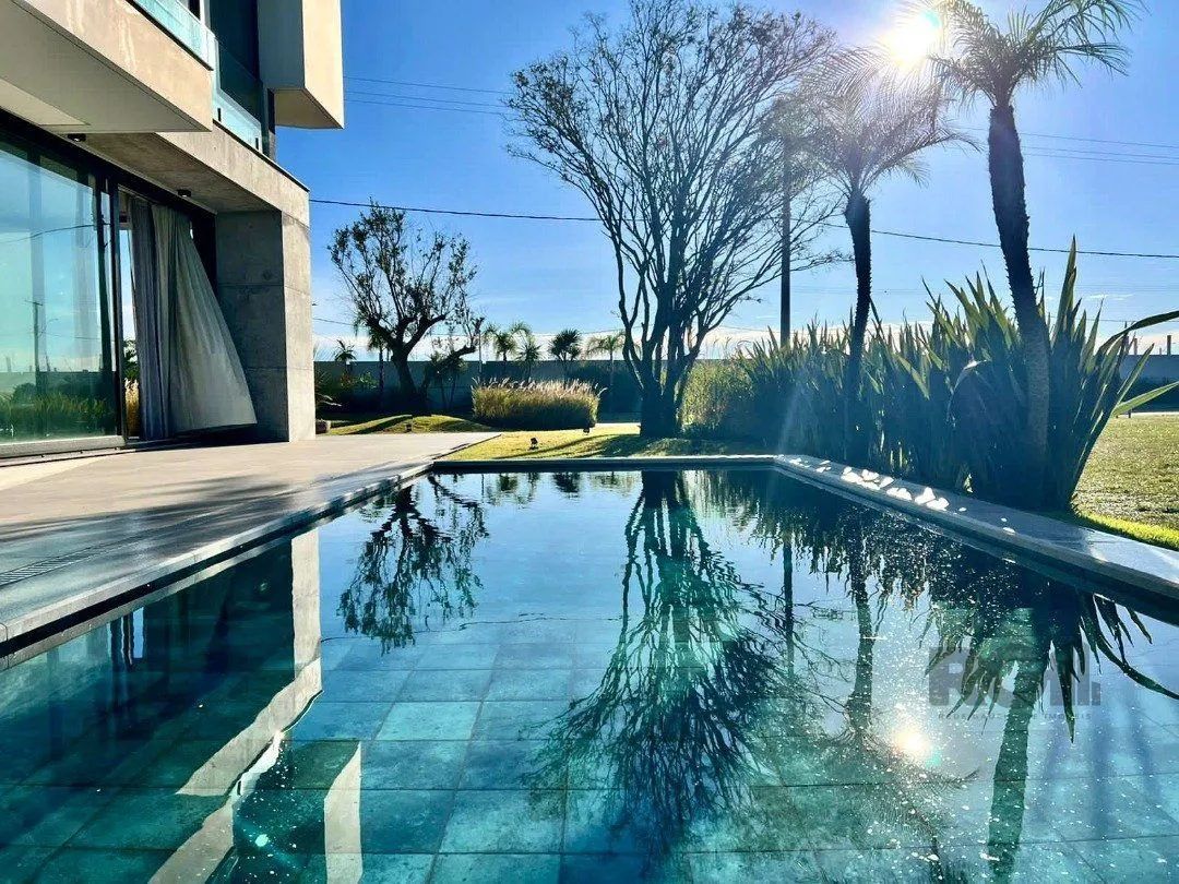 Imagem Casa de Condomínio em Atlântida Sul