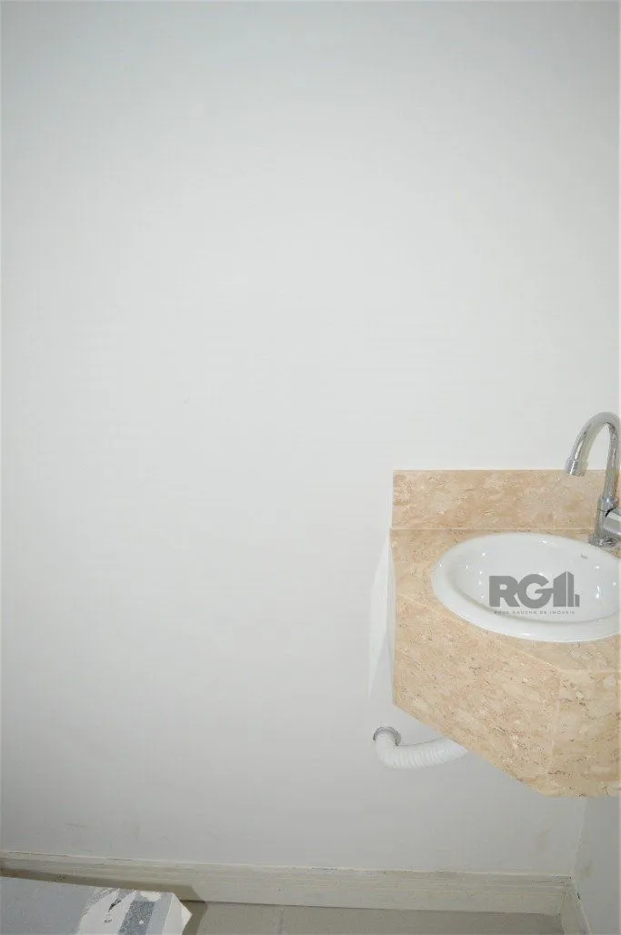 Imagem Lindo apartamento 2 dormitórios com 2 suítes, lavabo, vaga de garagem, amplo living 2 ambientes e cozinha com churrasqueira.