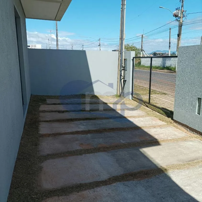 Imagem Sobrado de 3 dormitorios com suite e 2 vagas a venda na Morada das Palmeiras em Torres