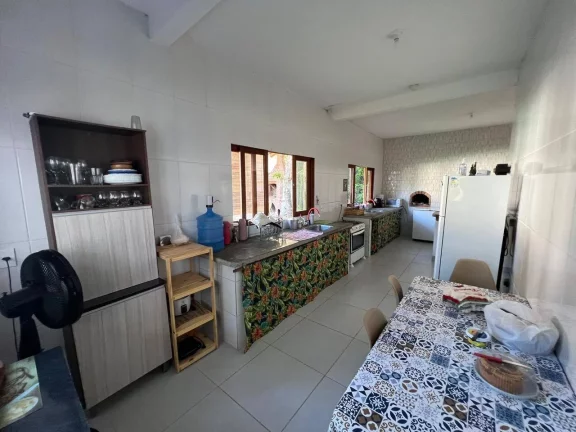 Imagem CASA BOMBAÇA COM SALÃO DE EVENTOS