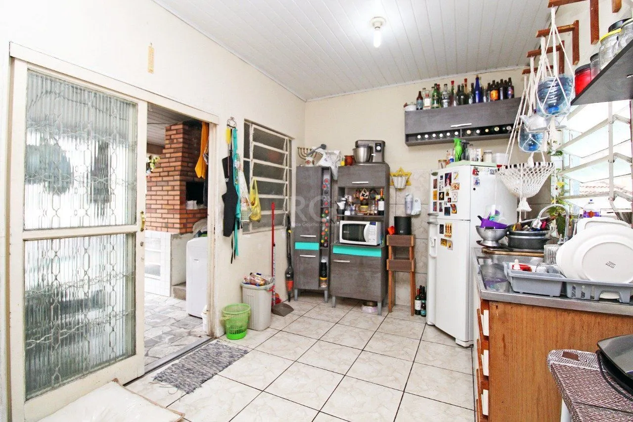 Imagem Casa para Venda - 85m², 2 dormitórios, 1 vaga - Cidade Baixa