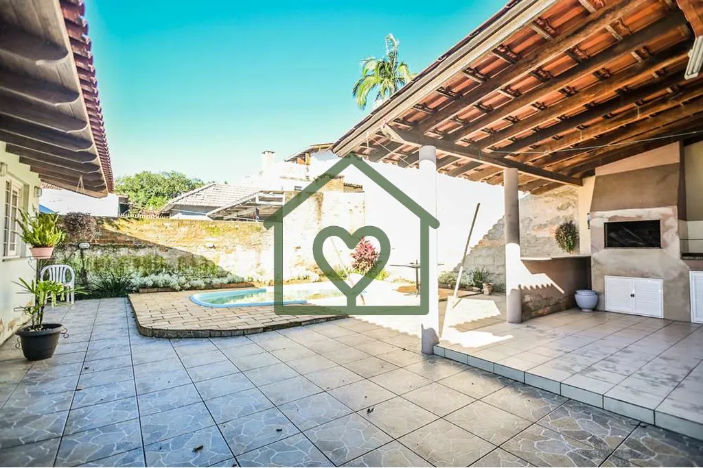 Imagem Esta casa ampla de 150m² está muito bem distribuída e oferece três dormitórios confortáveis. A...