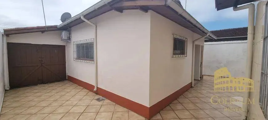 Imagem Casa com 4 dormitórios à venda por R$ 643.000,00 - Solemar - Praia Grande/SP