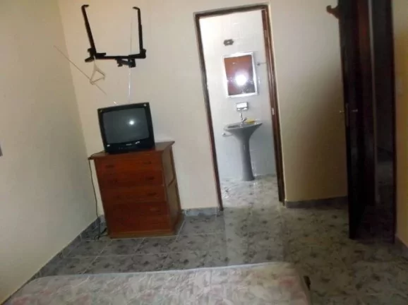 Imagem casa lado praia- tres dormitorios