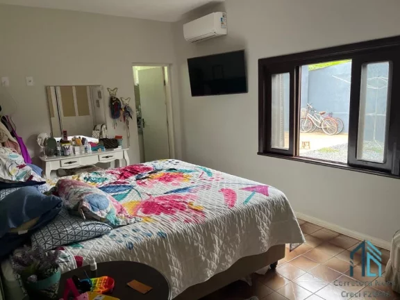 Imagem Casa em Condomínio a venda, 04 quartos sendo duas suítes, piscina em Cajati SP