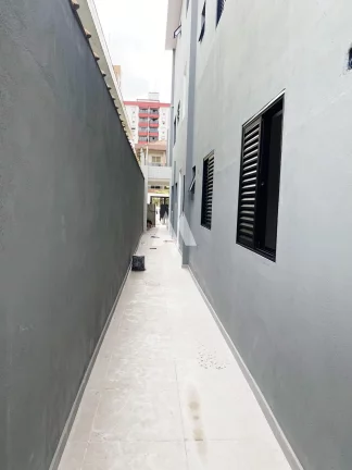 Imagem Casa Sobreposta Baixa 3 quartos e suítes, 2 vagas - Embaré / Santos