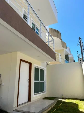Imagem Belíssima casa duplex composta de 3 quartos sendo uma suíte área gourmet com churrasqueira bairro Ipiranga Guarapari