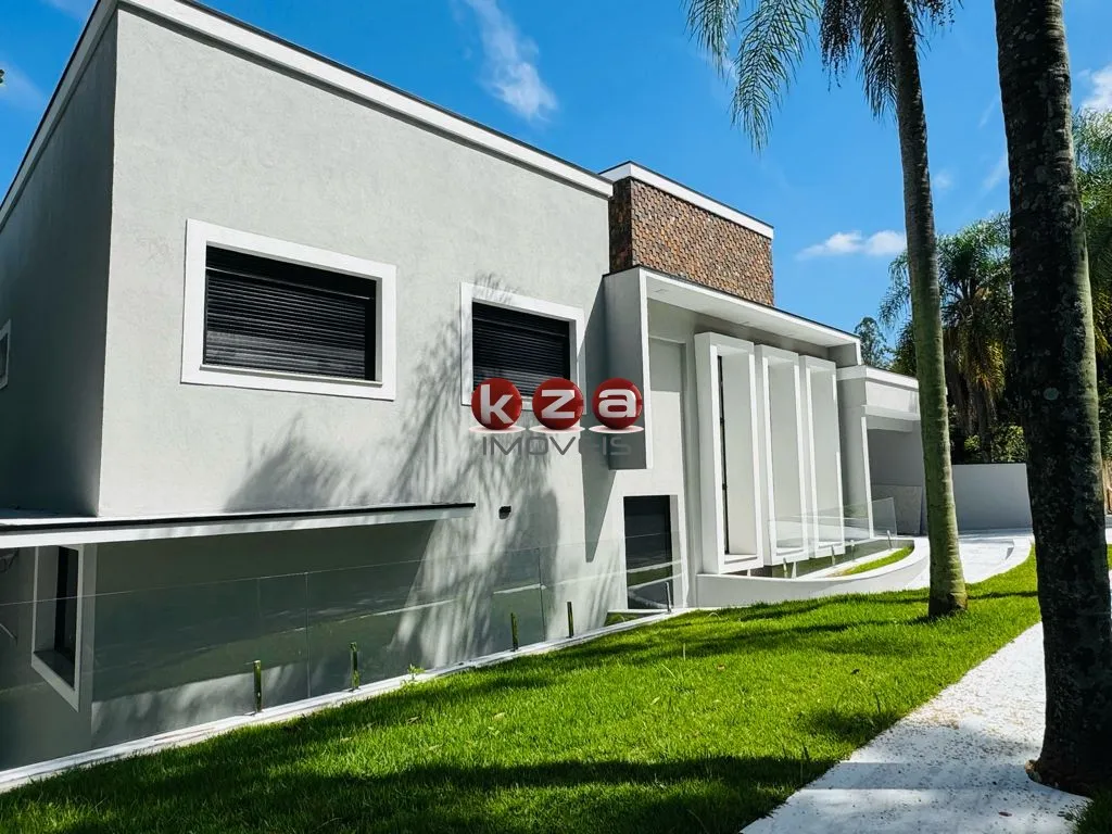 Imagem Casa de Luxo em Condomínio: 5 suítes, 5 salas, 9 banheiros, 4 vagas na cidade de Valinhos-SP, Condomínio Vale do Itamaracá - 760m².