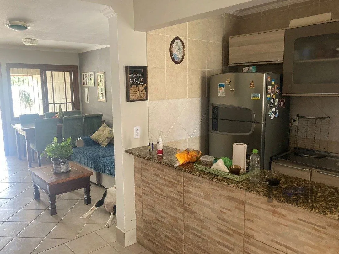 Imagem CASA | 2 DORMITÓRIOS | 1 SUÍTE | 2 VAGAS | PISCINA | SACADA | BAIRRO HÍPICA | ZONA SUL