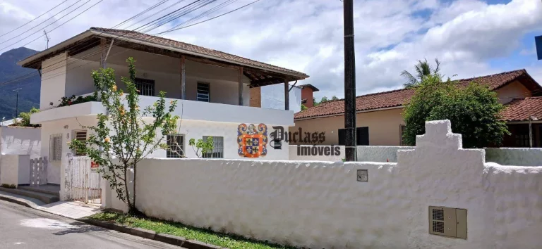Foto do imóvel Sobrado com 4 dormitórios à venda, 180 m² por R$ 480.000,00 - Massaguaçu - Caraguatatuba/SP