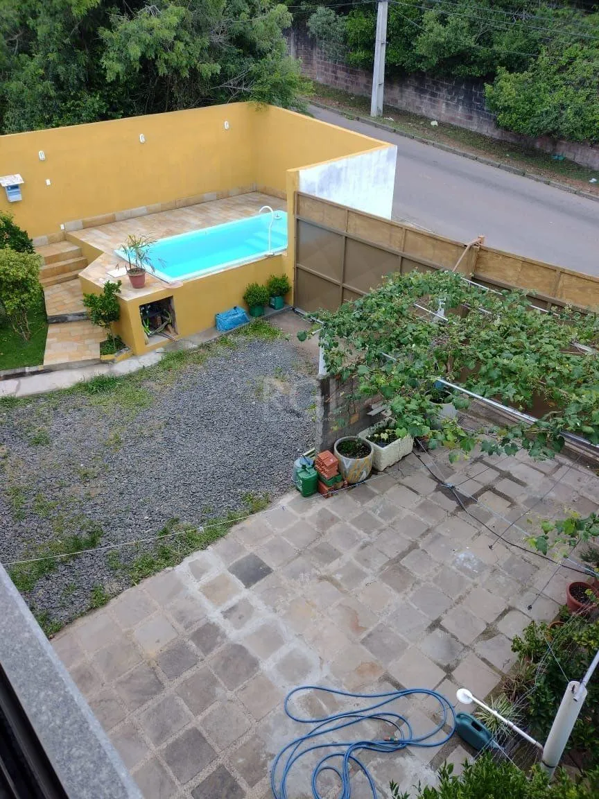 Imagem Casa para Venda - 0.18m², 2 dormitórios, sendo 2 suites, 3 vagas - Lomba do Pinheiro
