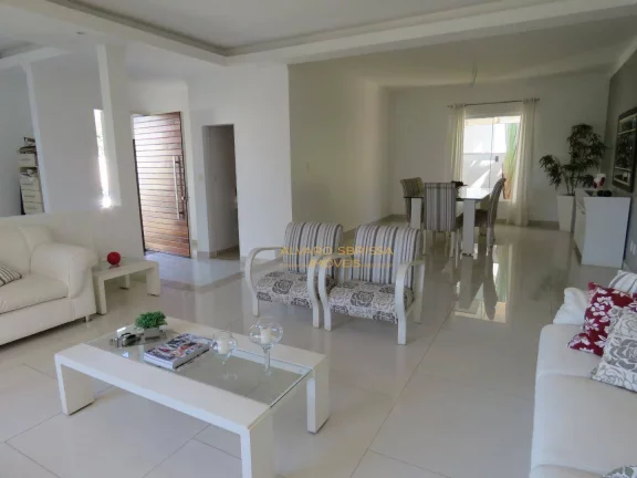 Imagem Casa térrea, com piscina, muito bem conservada e moderna com 600m² de terreno e 300m² de construção com 04 suítes. Estuda Permuta