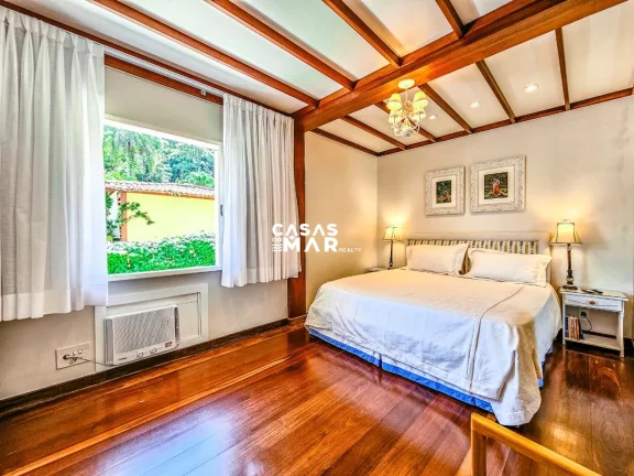 Imagem Casa de Luxo à Beira Mar em Angra dos Reis: 6 Suítes, 7 Salas, 950m² - Piscina, Churrasqueira e Deck Privativo