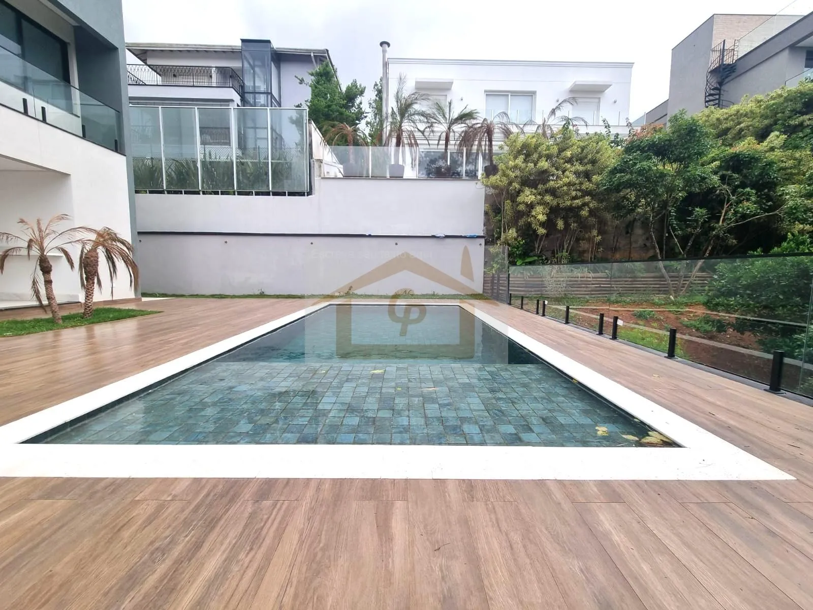 Imagem Casa inteligente, 5 suítes, 3 vagas cobertas, Bosque privativo -Arquitetura Contemporânea