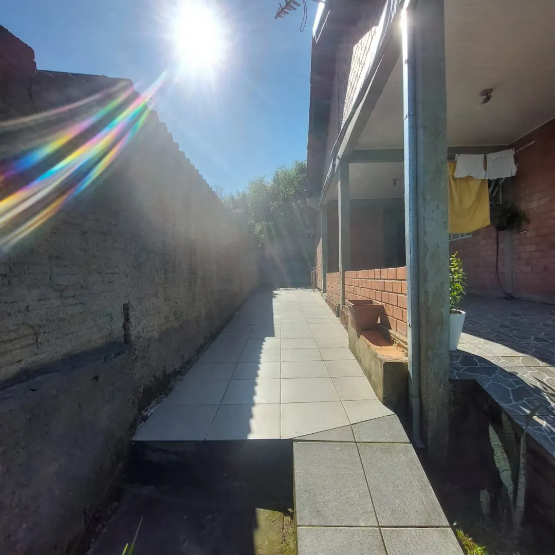 Imagem Casa com Piscina à Venda em Santo Onofre, Viamão