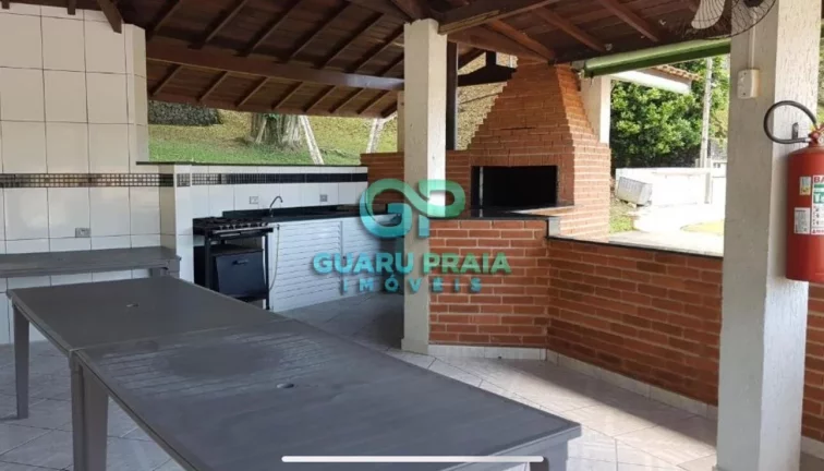 Imagem 3 dormitórios, 1 suíte com closet, pequena vista para o mar, sala para dois ambientes, varanda com vista para área verde, cozinha americana