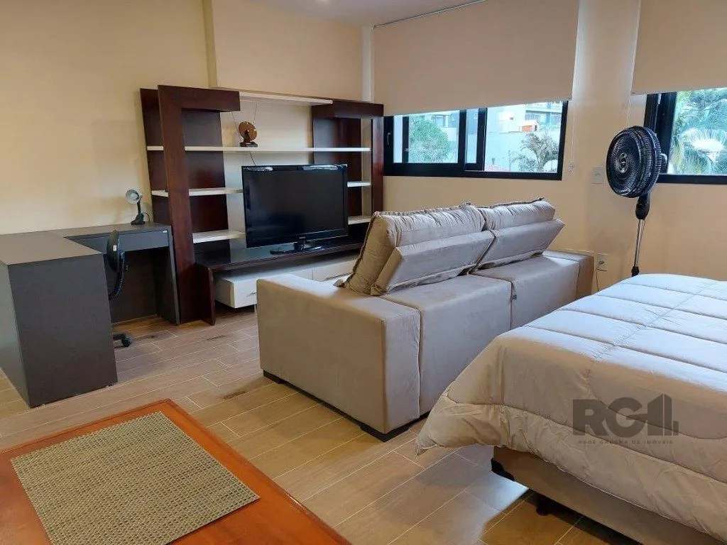 Imagem Apartamento stidio com 1 dormitório, 1 vaga de garagem no Bairro Auxiliadora.