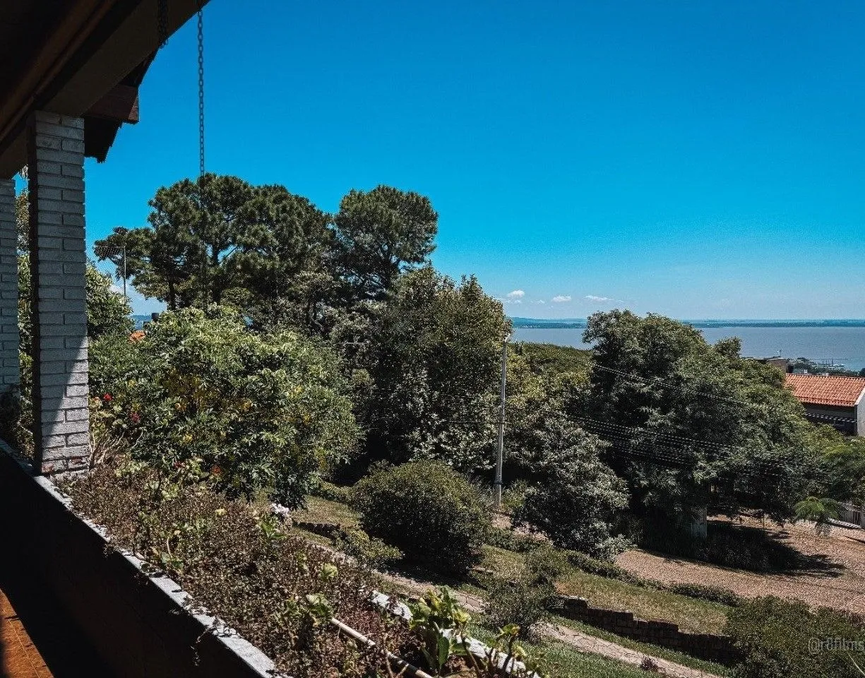 Imagem Casa bairro Sétimo Céu, 463m² privativos, vista privilegiada do Rio Guaíba em terreno de 1.423m².