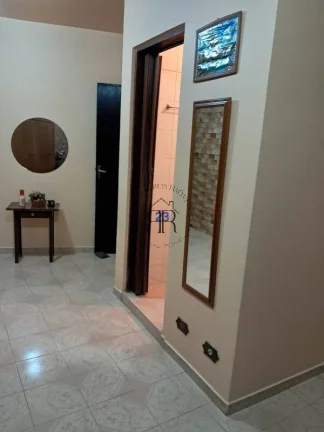Imagem Sobrado com dois dormitórios sendo um suíte, área gourmet, sala e cozinha grandes, móveis planej...