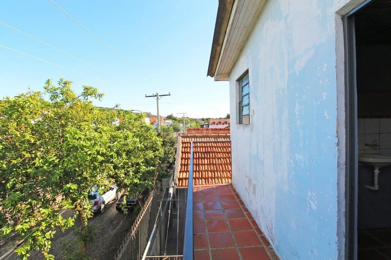 Imagem Casa 5 dormitórios, 1 suíte, 2 vagas de garagem, no bairro Camaquã, Poa/RS.