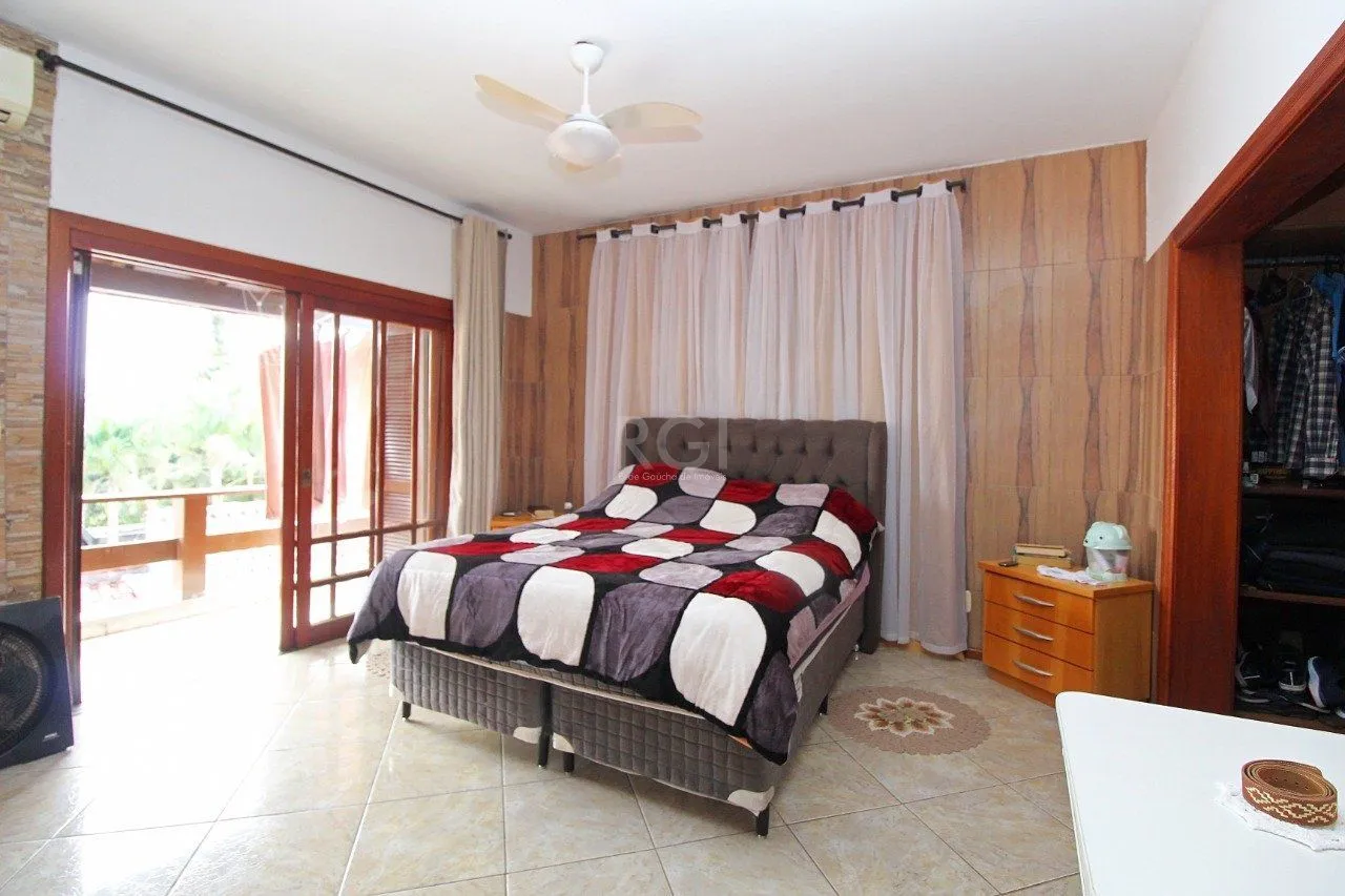 Imagem Casa para Venda - 339m², 3 dormitórios, 2 vagas - Vila Nova, Porto Alegre
