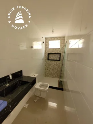 Imagem Casa Linear 3 quartos sendo uma suíte duas vagas de garagem porcelanato Santa Mônica Guarapari