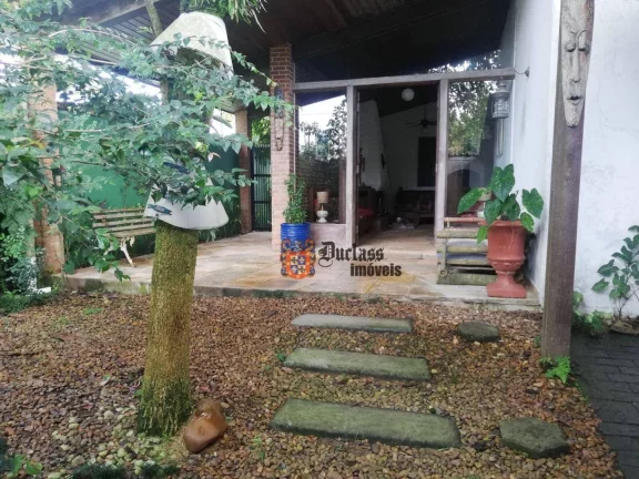 Imagem Casa com 4 dormitórios à venda, 160 m² por R$ 1.000.000 - Balneário Praia do Pernambuco - Guarujá/SP