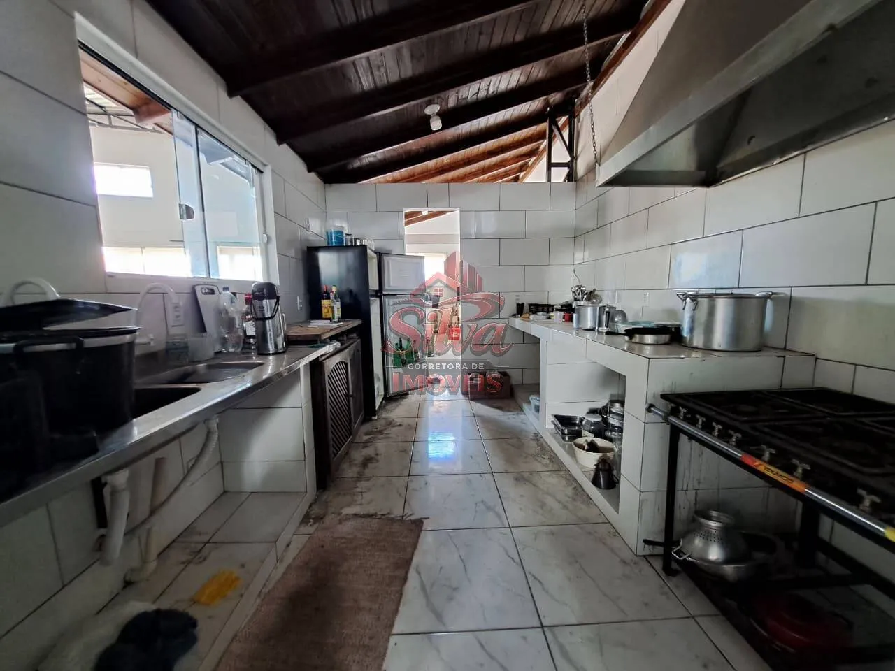 Imagem PC104 | Prédio comercial na avenida em Presidente