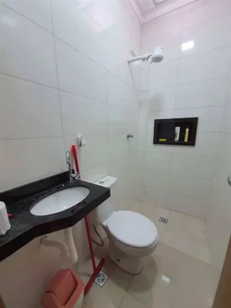 Imagem Casa com 2 dormitórios à venda, 70 m² por R$ 398.000 - Caiçara - Praia Grande/SP