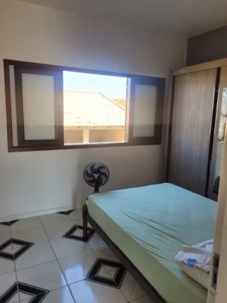 Imagem Imperdível oportunidade de adquirir uma casa com 3 quartos e 6 vagas de garagem em Balneário Rincão-SC, Zona Norte! BRP012