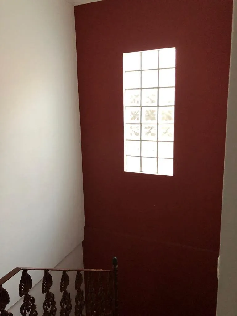 Imagem Sobrado à Venda no Jardim das Flores: 2 Suítes, Churrasqueira e Quintal
