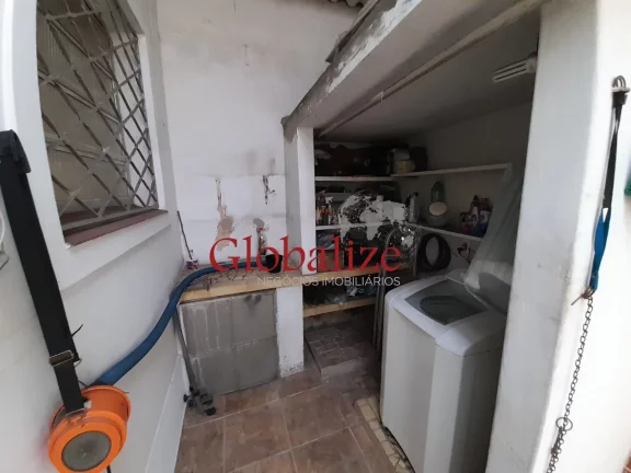 Imagem Casa com 3 dormitórios e 2 vagas à venda no Macuco em Santos R$ 900.000,00