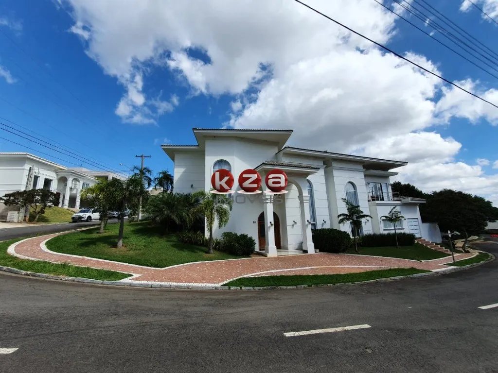 Imagem Casa de luxo no Condomínio Portal do Lago: 4 suítes, 3 salas, 7 banheiros, 2 vagas, 541m² em Valinhos-SP. Venda ou locação.
