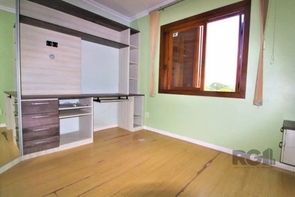 Imagem Casa em condomínio 111m² - 3 dormitórios sendo 1 suíte e 4 vagas no bairro Espirito Santo