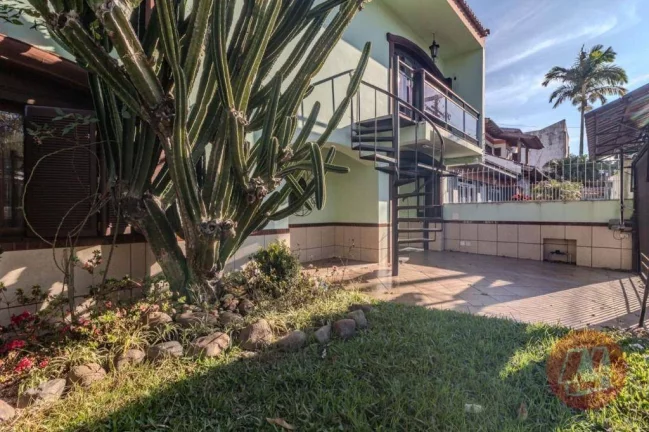 Imagem Casa com 5 dormitórios para alugar, 270 m² por R$ 7.222,00/mês - Partenon - Porto Alegre/RS