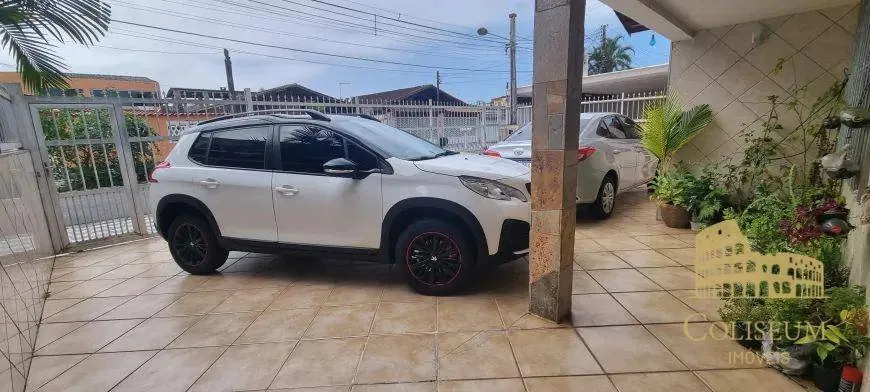 Imagem Casa com 4 dormitórios à venda por R$ 643.000,00 - Solemar - Praia Grande/SP