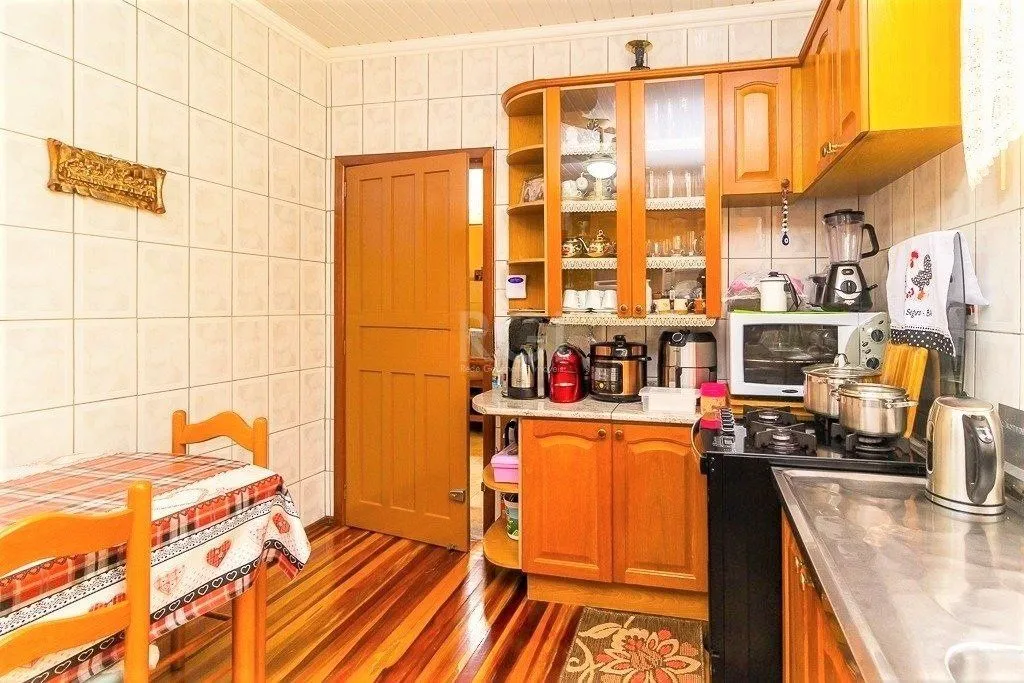 Imagem Casa para Venda - 148m², 2 dormitórios, 1 vaga - Partenon