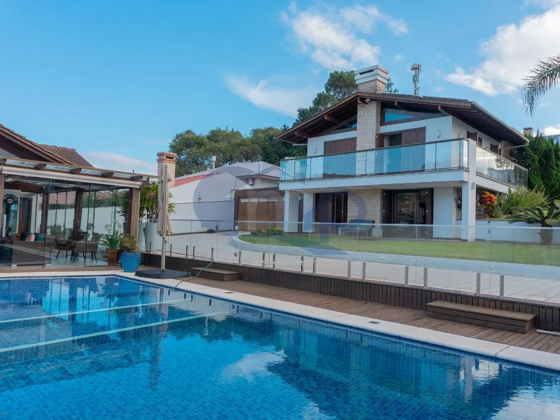 Imagem Casa de Alto Padrao com 4 Dormitorios, Piscina Aquecida e Espaço Gourmet no Centenario, em Torres/RS