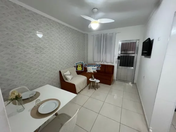 Imagem "Viva a experiência de morar pertinho da areia, em um apartamento aconchegante de 1 dormitório, porteira fechada, situado a poucos passos da praia, com uma vista lateral encantadora do mar que torna cada dia mais especial." Por apenas R$ 270.000,00. Agend