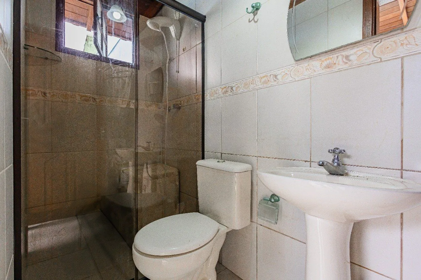 Imagem Casa de 4 dormitórios e 208m² à venda no Bairro Jardim Botânico, Porto Alegre.