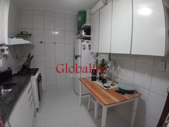 Imagem Casa em Vila à venda com 2 quartos, 2 banheiros, churrasqueira na Vila Mathias em Santos por R$426.000,00