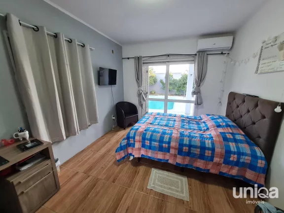Foto do imóvel Casa de 04 dormitórios para venda em Camobi com Energia Solar e Piscina