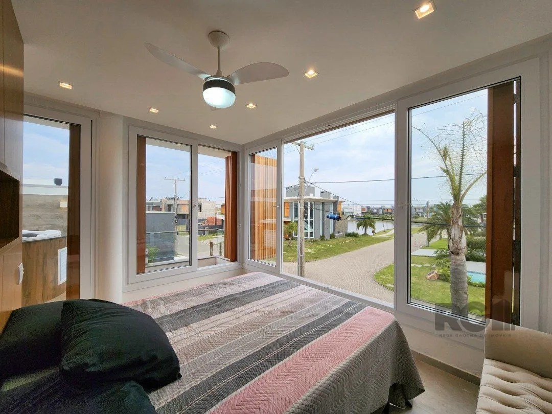 Imagem Casa de Condomínio em Atlântida Sul