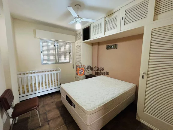 Imagem Apartamento com 4 dormitórios à venda, 136 m² por R$ 585.000 - Pitangueiras - Guarujá/SP
