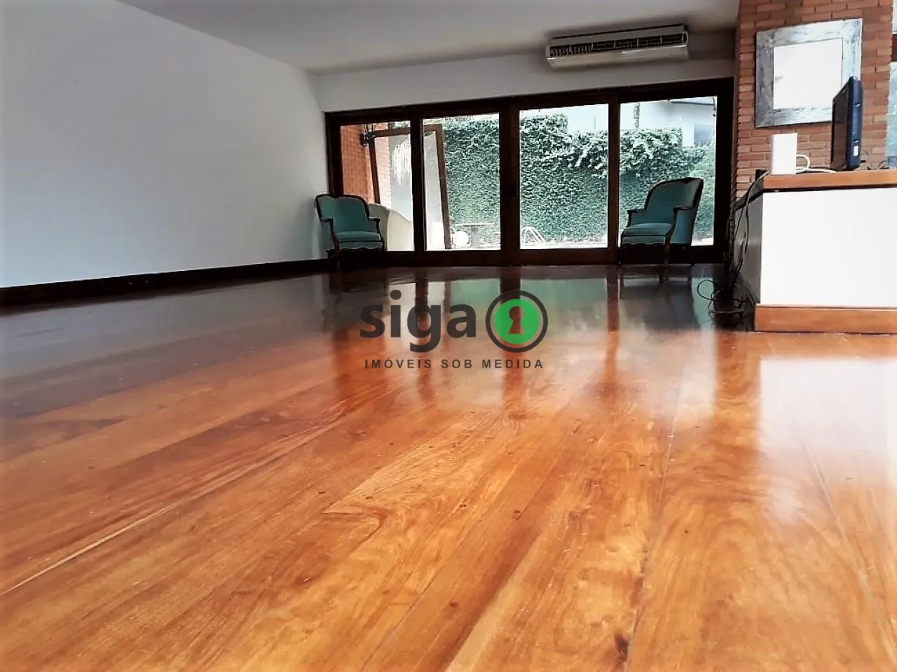Imagem Casa de Luxo Projetada por Marcos Tomanik no Morumbi - Vizinha a Área Verde Tombada