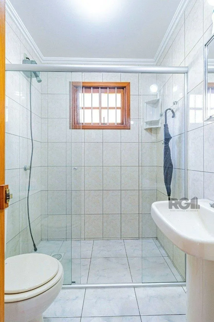Imagem Casa com 267m², 3 dormitórios, 1 vaga no bairro Tristeza
