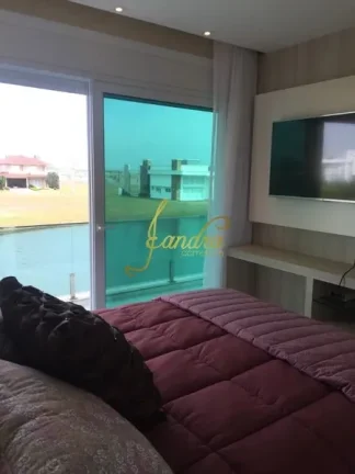 Imagem Casa condomínio com 05 suites e piscina aquecida
