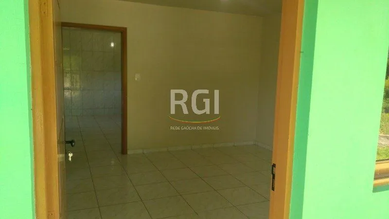Imagem Casa para Venda - 100m², 3 dormitórios, 2 vagas - Centro