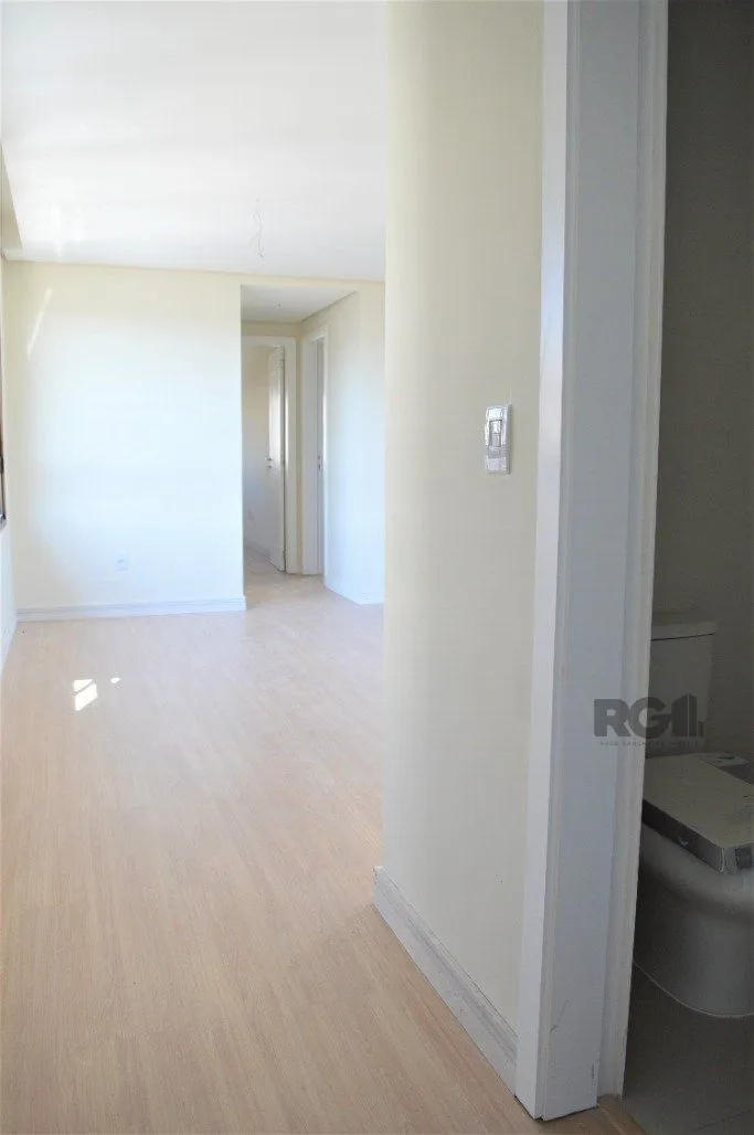 Imagem Lindo apartamento 2 dormitórios com 2 suítes, lavabo, vaga de garagem, amplo living 2 ambientes e cozinha com churrasqueira.